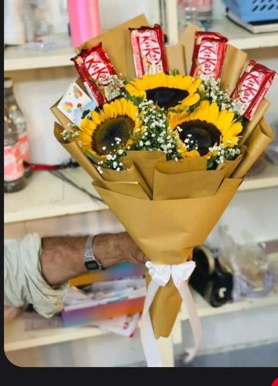 Choclates with sunshine flowers